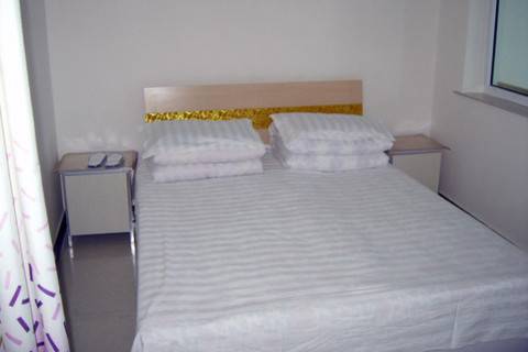Kan kou tzu China Traveller Hotel Gutscheincode Booking.com